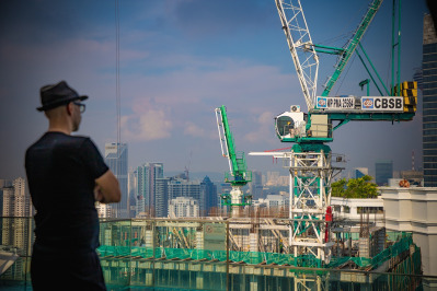 construction site workers crane